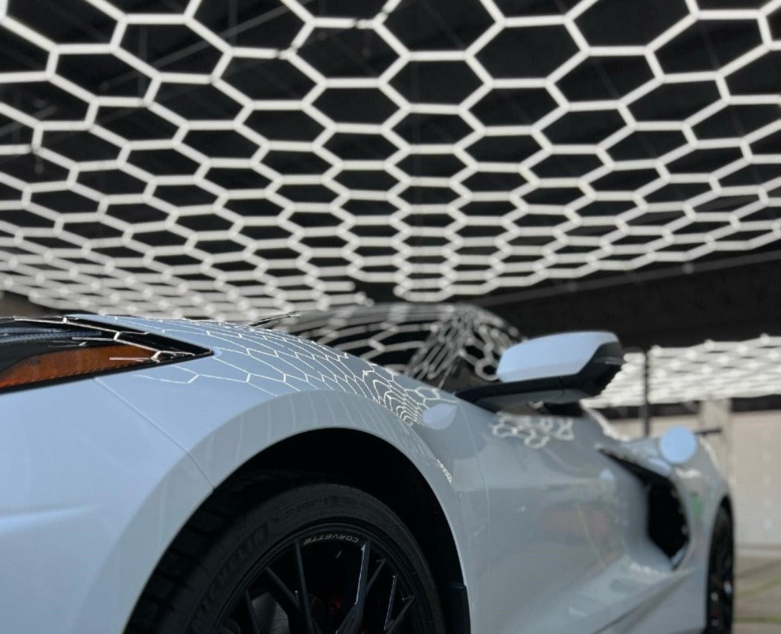 Hex Garage Lights 50x60 Hexagon Grid Over and white corvette in detail shop