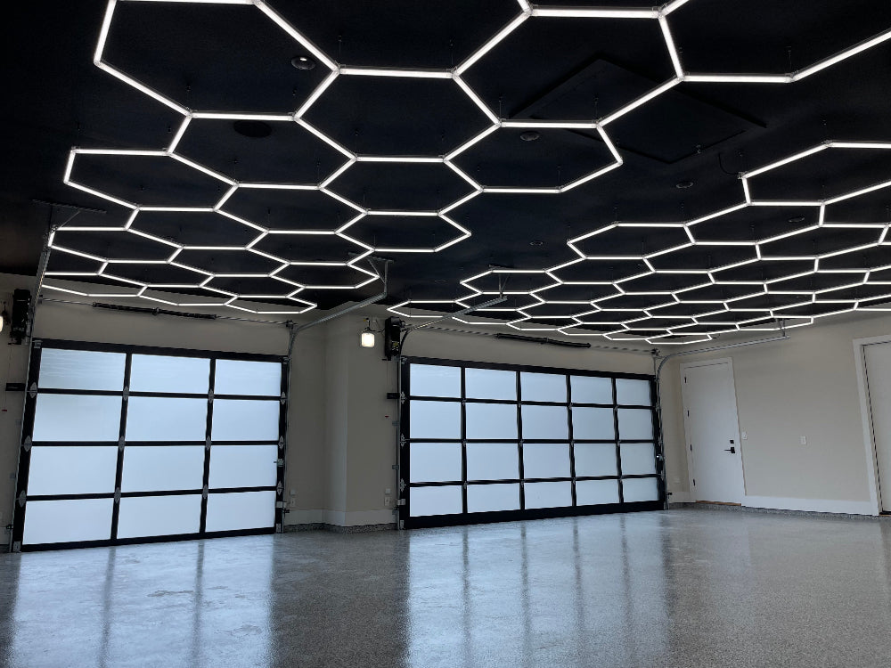 Dimmable hexagon lighting in four car garage 5000K