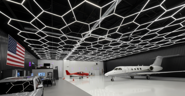 Modern airplane hangar with geometric ceiling design and private jet