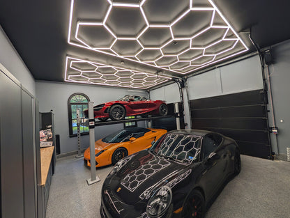 8ft x 15.7ft hexagon garage light grid over McLaren, Lamborghini and Porsche