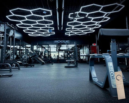 10 x 20 ft hexagon light grids over a gym floor; low voltage 24V, 0-10V dimmable, remote control included