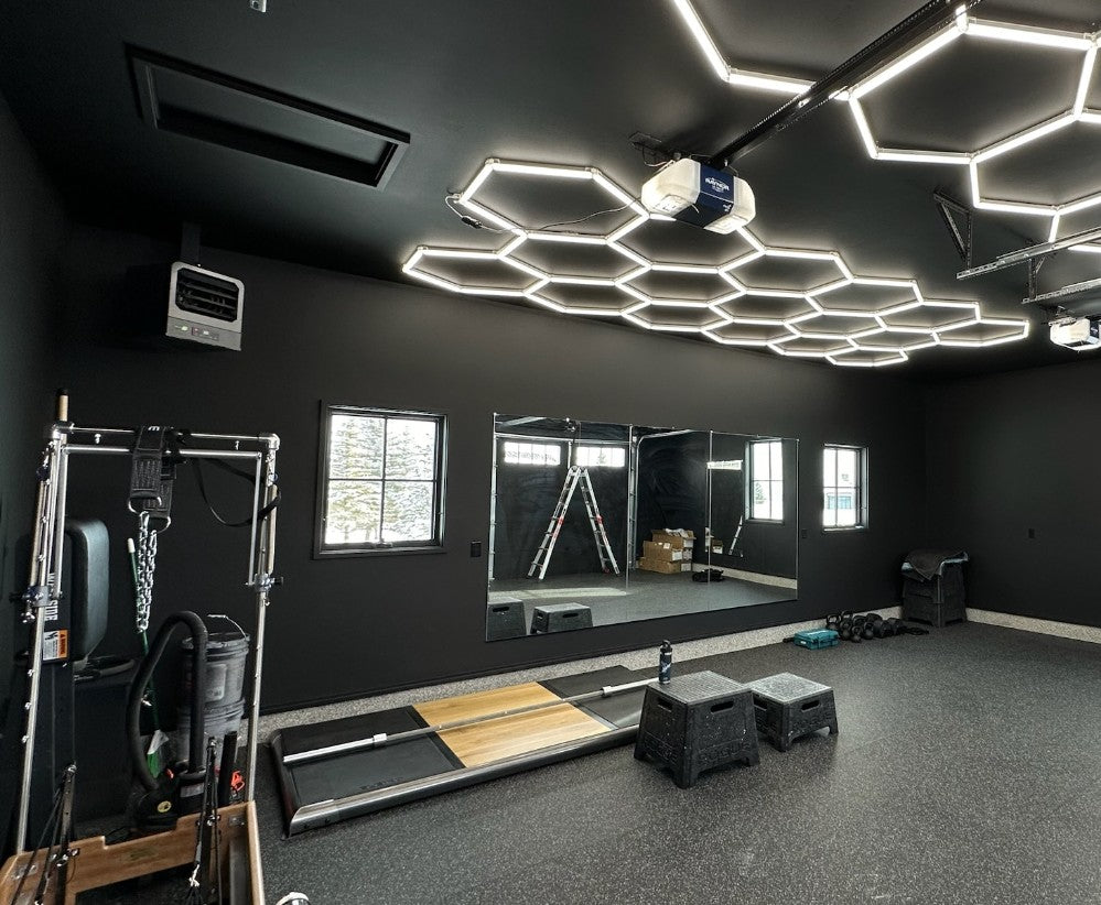 16.2 x 7.8 ft hexagon light grid in a black garage gym; low voltage 24V, 0-10V dimmable, remote control included
