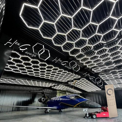 20 x 40 ft hexagon light grid in a private jet hangar; low voltage 24V, 0-10V dimmable, remote control included