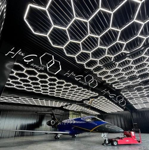 20 x 40 ft hexagon light grid in a private jet hangar; low voltage 24V, 0-10V dimmable, remote control included