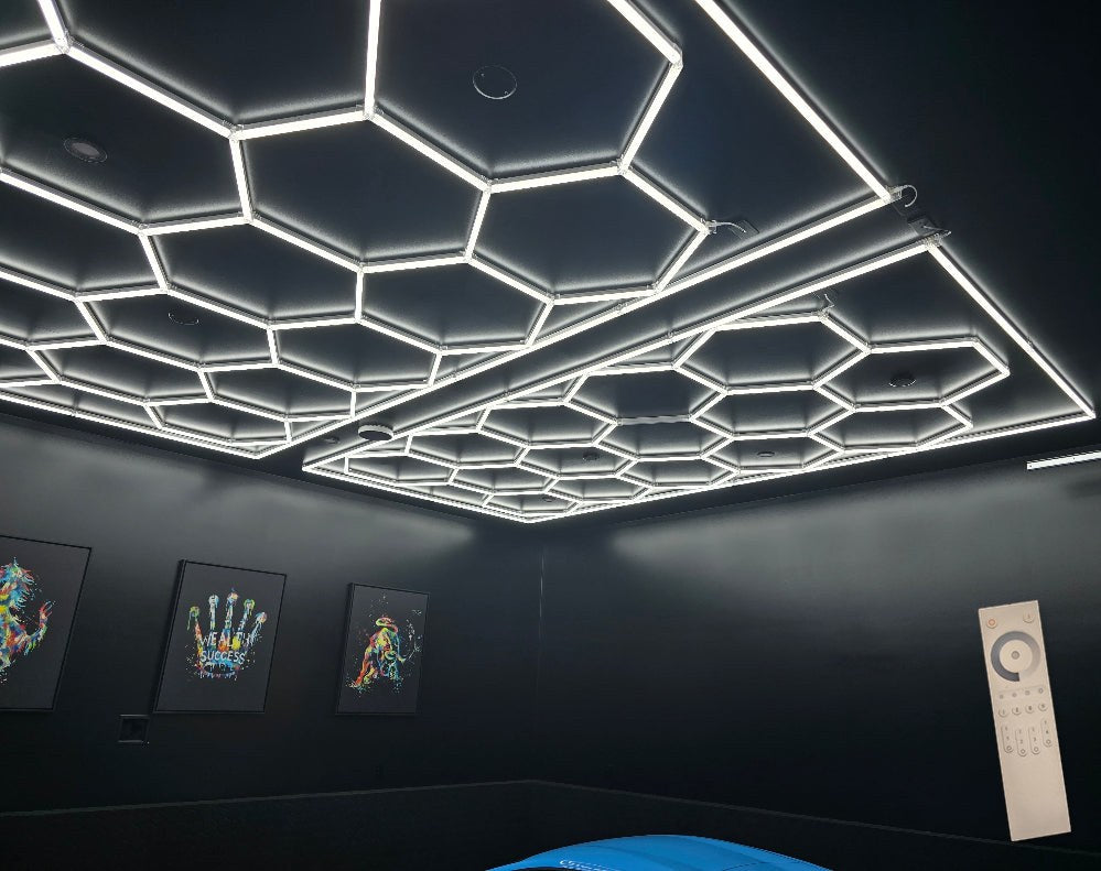 8 x 15.7 ft hexagon light grid on a black ceiling in a dark room; low voltage 24V, 0-10V dimmable, remote control included