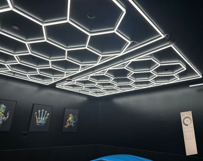 8 x 15.7 ft hexagon light grid on a black ceiling in a dark room; low voltage 24V, 0-10V dimmable, remote control included