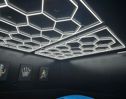 8 x 15.7 ft hexagon light grid on a black ceiling in a dark room; low voltage 24V, 0-10V dimmable, remote control included