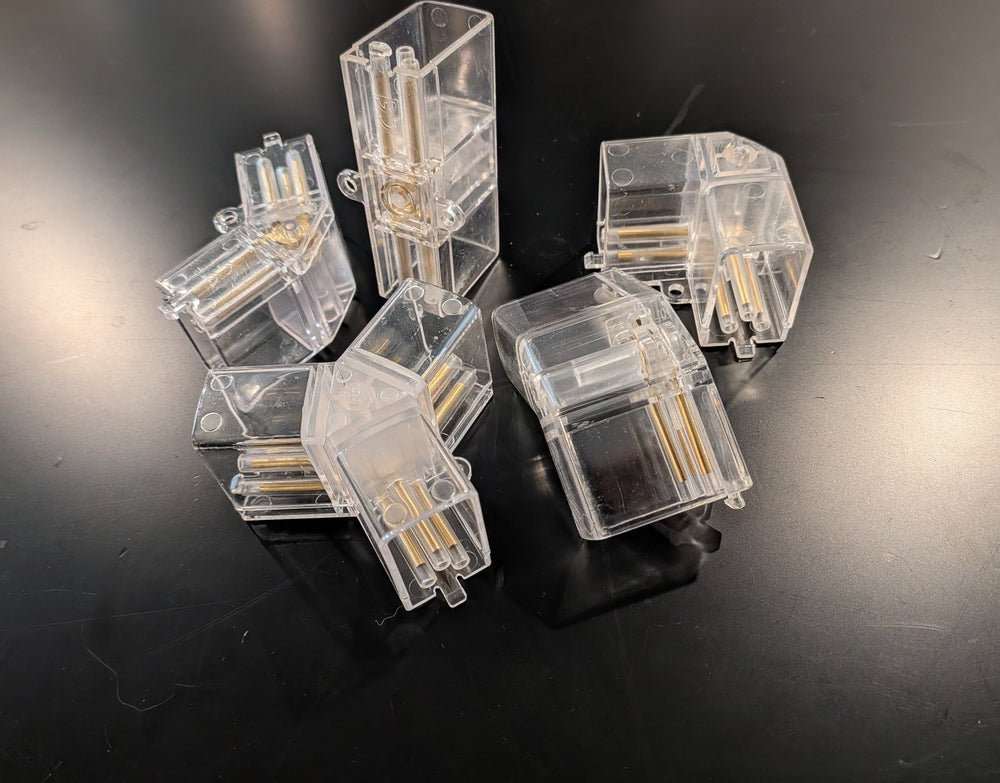 Clear hexagon light connectors with integrated mounting holes for flush or suspended installation